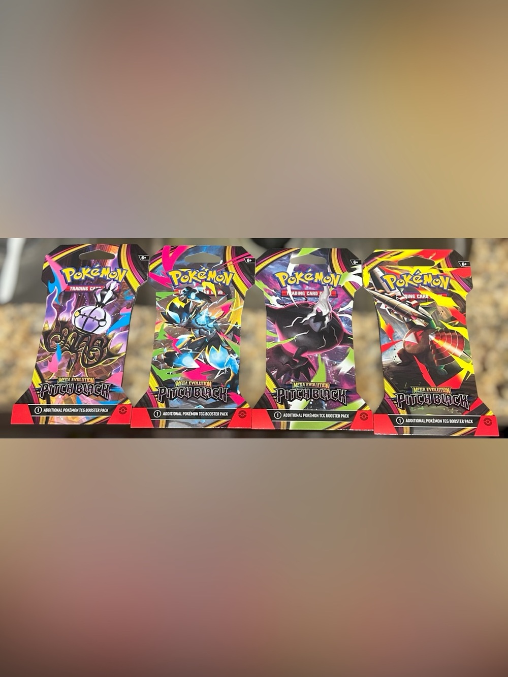 Pokémon Mega Evolution: Pitch Black Sleeved Booster Pack (Set of 4) - UNOPENED
